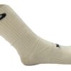 medias canilleras nike beige